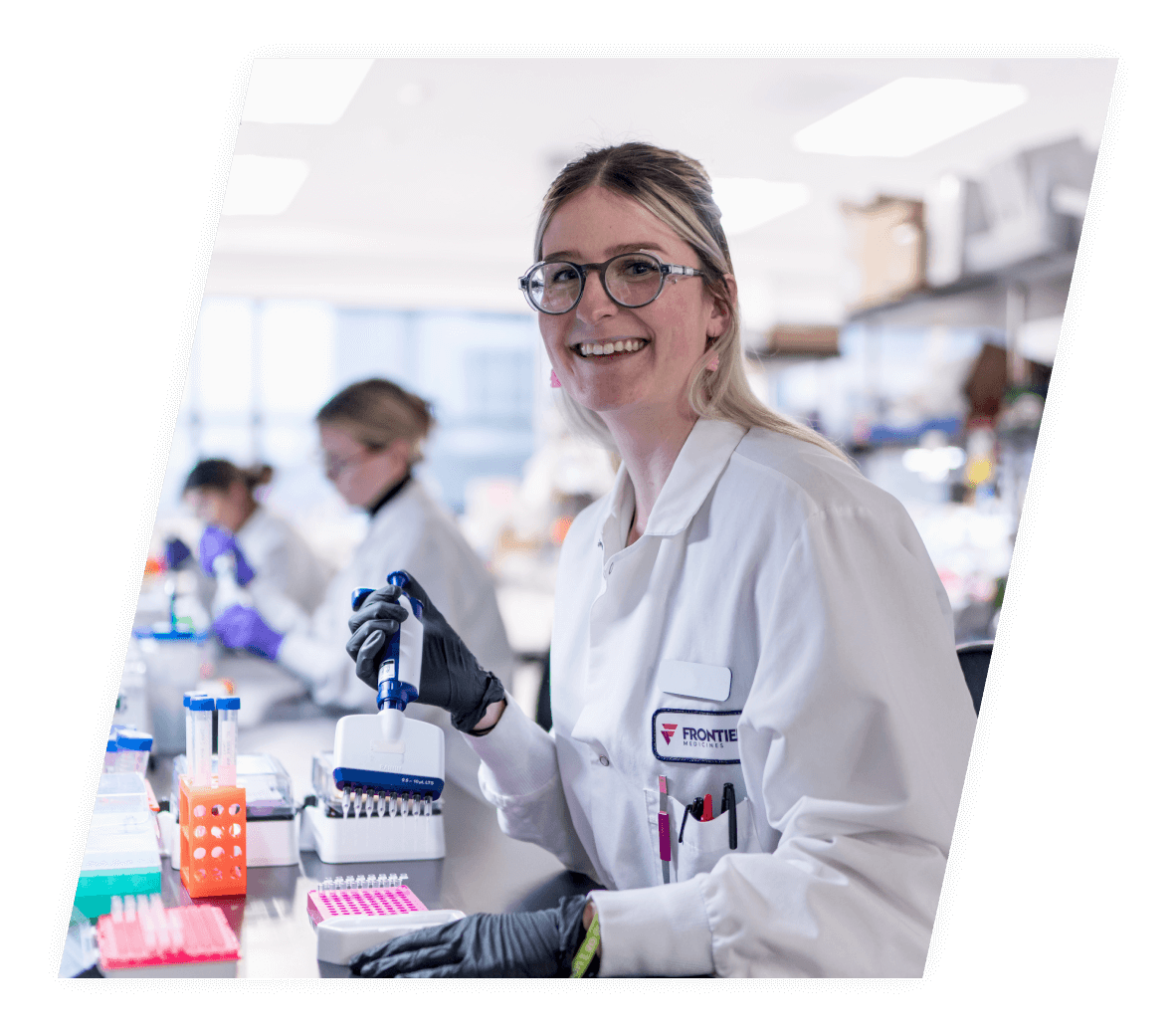 home_patients Group of Frontier Medicines scientists smiling