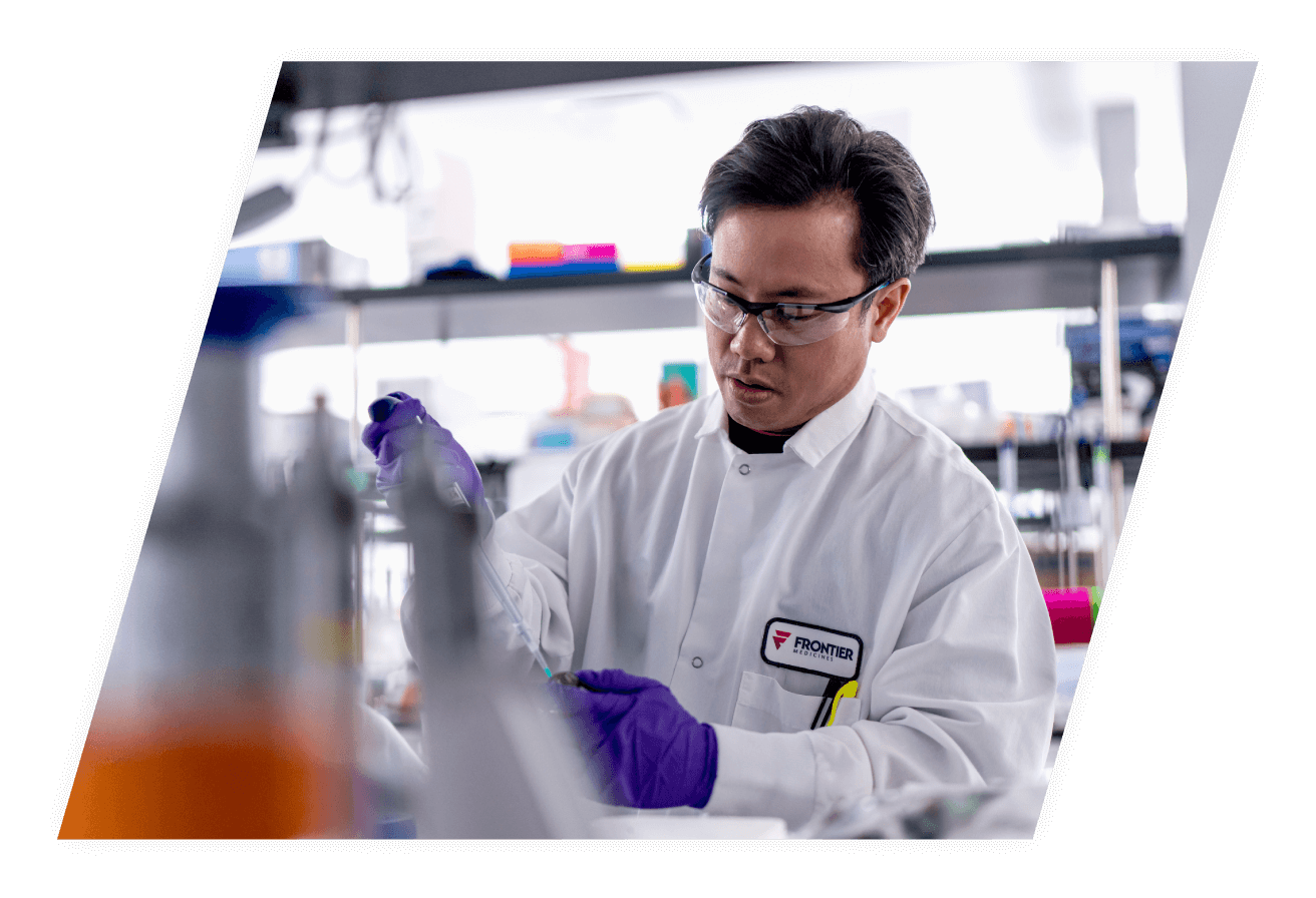 home_precision Frontier Medicines scientist pipetting